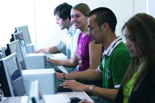 Students working in a computer lab.